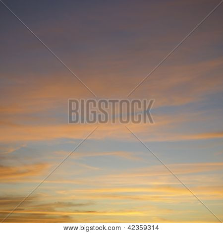 Blue Sky And Orange Clouds