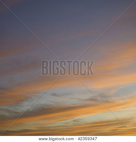 Blue Sky And Orange Clouds
