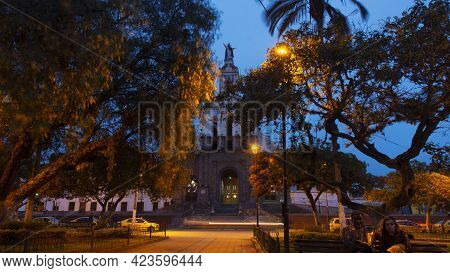 Cotacachi, Imbabura / Ecuador - June 13 2021: Night View Of Vehicles Circulating In Front Of The Cat