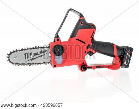 Winneconne, Wi - 10 June 2021:  A Package Of Milwaukee Hatchet Chainsaw Battery M12 On An Isolated B
