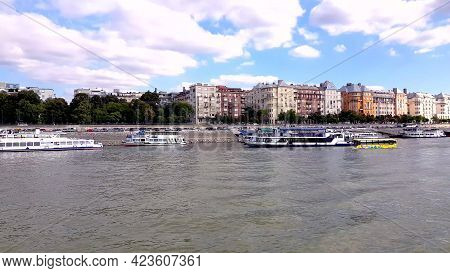 Comfortable Yellow Bus Tour Floating On River Danube. Amphibian Bus Floating On The River Towards Th