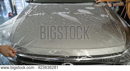 Process Of Armoring Car Hood With Transparent Polyurethane Anti-gravel Film Cover Coating Or Ppf In 