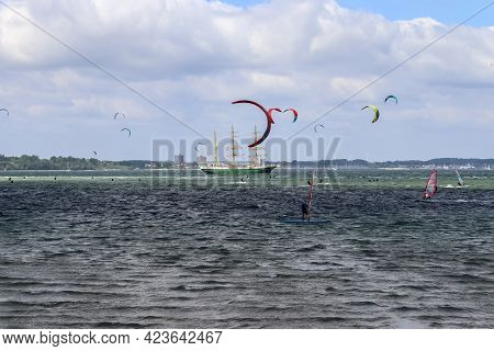Lots Of Kite Surfing Activity At The Baltic Sea Beach Of Laboe In Germany On A Sunny Day