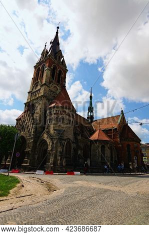 Chortkiv, Ukraine-may 12, 2021:picturesque Landscape View Of Gothic Saint Stanislaus Cathedral. Blue