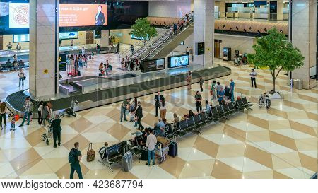 Baku, Azerbaijan - July 2019: Arriving Passengers Collecting Their Luggage In Heydar Aliyev Airport