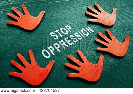 Stop Oppression Concept. Red Hands And Phrase.