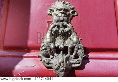 European Vintage Old Metal Wrought Iron Door Knocker. Design Detail. Paris.