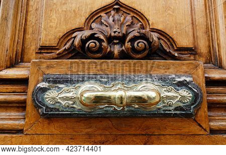 European Vintage Old Metal Wrought Iron Door Knocker. Design Detail. Paris.