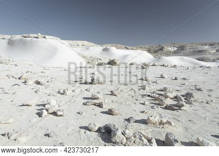 Beautiful Lunar Landscape. Wight And Smooth Hills In Various Shapes In A Desert Landscape. The Whiti