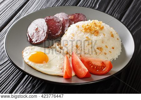 Filipino Fried Rice Recipe Sinangag With Crispy Garlic, Egg And Meat Close Up In The Plate On The Ta