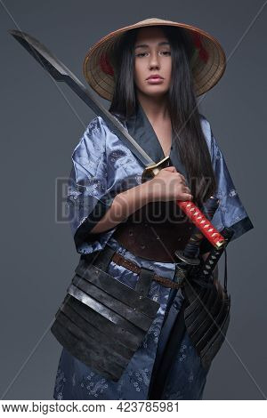 Female Japanese Killer With Samurai Sword And Hat