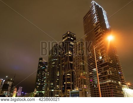 Towerblocks Lit Up In Night City Of Miami, Usa