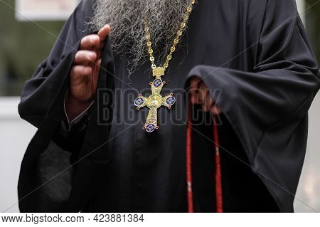 Bucharest, Romania - June 14, 2021: Details With The Prayer Robe And Golden Cross Of A High Ranking 