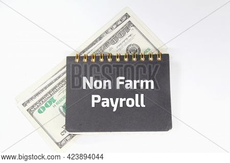 Banknotes, Notebooks With The Words Non Farm Payroll