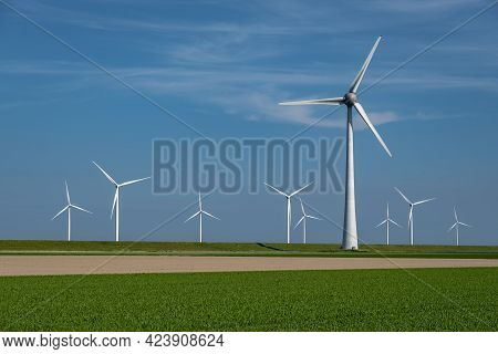 Wind Turbine From An Aerial View, Drone View At Windpark A Windmill Farm In The Lake Ijsselmeer The 