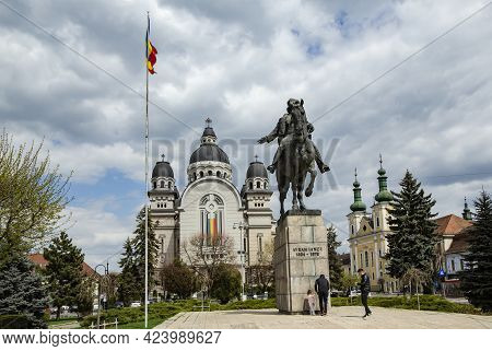 Targu Mures, Transylvania, Romania - April 23, 2021:  Avram Iancu Statue And Ascension Of The Lord, 