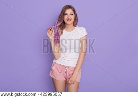 Young Attractive Female With Flirting Expression Wearing Casual Style Attire, Looking Directly At Ca