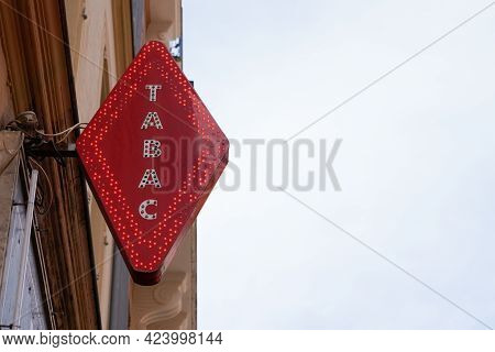 Toulouse , Occitanie France - 06 06 2021 : Tabac Text Sign Red Light Brand Of French Shop Logo For T