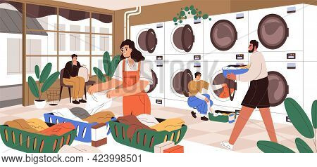 People At Public Launderette. Self-service Laundromat With Washing And Drying Machines. Modern Indus
