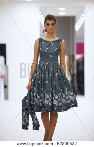 ZAGREB, CROATIA - OCTOBER 12: Fashion model in cocktail dress made by Lorien on 'Wedding Expo' show in the Westgate Shopping City in Zagreb, Croatia on October 12, 2013