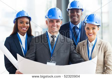 team of successful construction managers in office