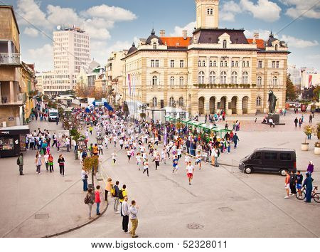 NOVI SAD, SERBIA - OCTOBER 13: Unidentified runners on the street during Novi Sad autumn Marathon on October 13, 2013 in Novi Sad, Serbia