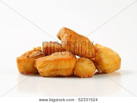 fried pieces of pork greaves