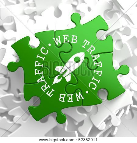 Web Traffic Concept on Green Puzzle Pieces.