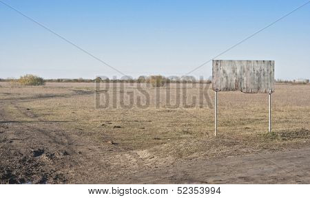 Wood sign with blue sky