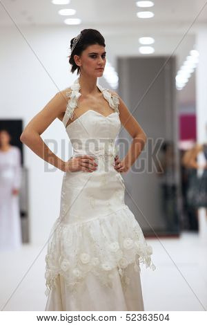 ZAGREB, CROATIA - OCTOBER 12: Fashion model in wedding dress made by Lorien on 'Wedding Expo' show in the Westgate Shopping City in Zagreb, Croatia on October 12, 2013