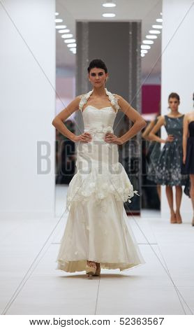 ZAGREB, CROATIA - OCTOBER 12: Fashion model in wedding dress made by Lorien on 'Wedding Expo' show in the Westgate Shopping City in Zagreb, Croatia on October 12, 2013
