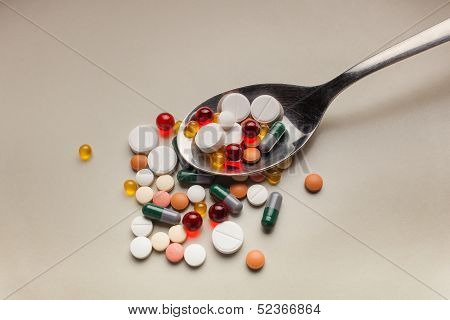 tablets on a spoon