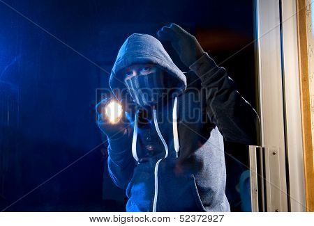 Burglar At Work