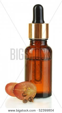 Ripe sliced grape and grapeseed oil, isolated on white