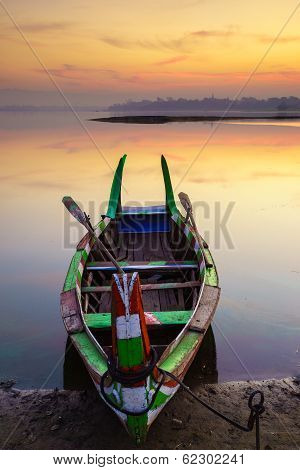 Wooden Boat In Ubein Bridge At Sunrise, Mandalay, Myanmar