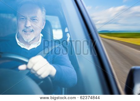 Portrait of a man driving a car