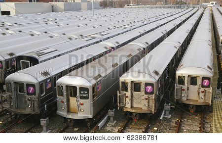 NYC subway cars in a depot