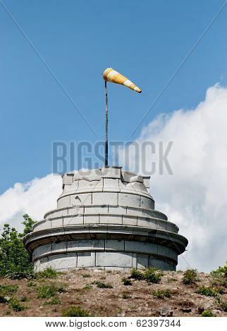Windsock On The Stone Tower