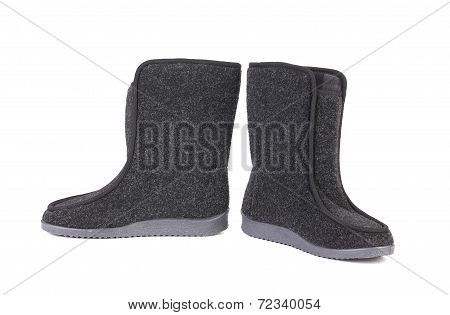 Pair of black felt boots.