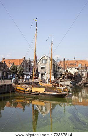 Old Dutch Sailing Vessels In The Harbor Of Spakenburg