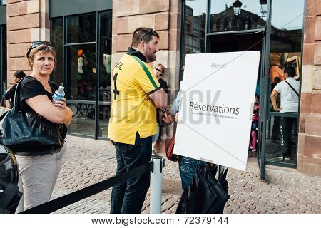 People wait in special line for new iPhone