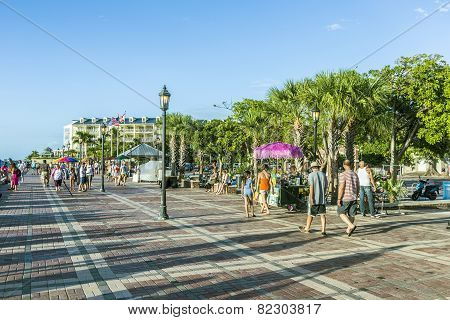 People Enjoy The Sunset Point At Mallory Square In Key Wes