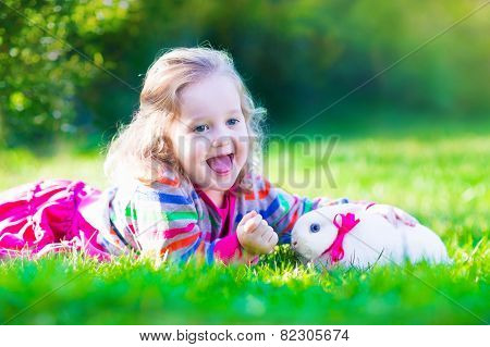 Little Girl And Real Rabbit