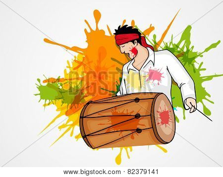 Young man playing drum on splash background for Indian festival of colors, Holi and Dolyatra celebration.