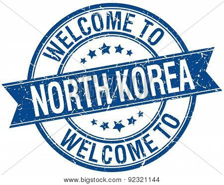 Welcome To North Korea Blue Round Ribbon Stamp