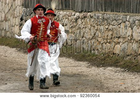 People In Traditional Costumes Celebrating The Winter Carnival