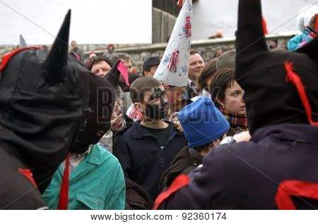 People In Traditional Costumes Celebrating The Winter Carnival