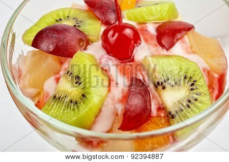 Fruit salad with ice cream in plate 