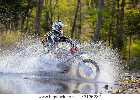Vladivostok, Russia - may 1, 2014: cars, motorcycles, ktm Enduro and ATV, go off-roading in five-day race Russian rally 2014