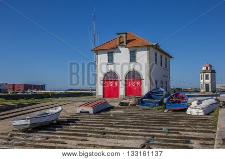VIANA DO CASTELO, PORTUGAL - APRIL 25, 2016: Little fishing boats in the harbor of Viana do Castelo, Portugal